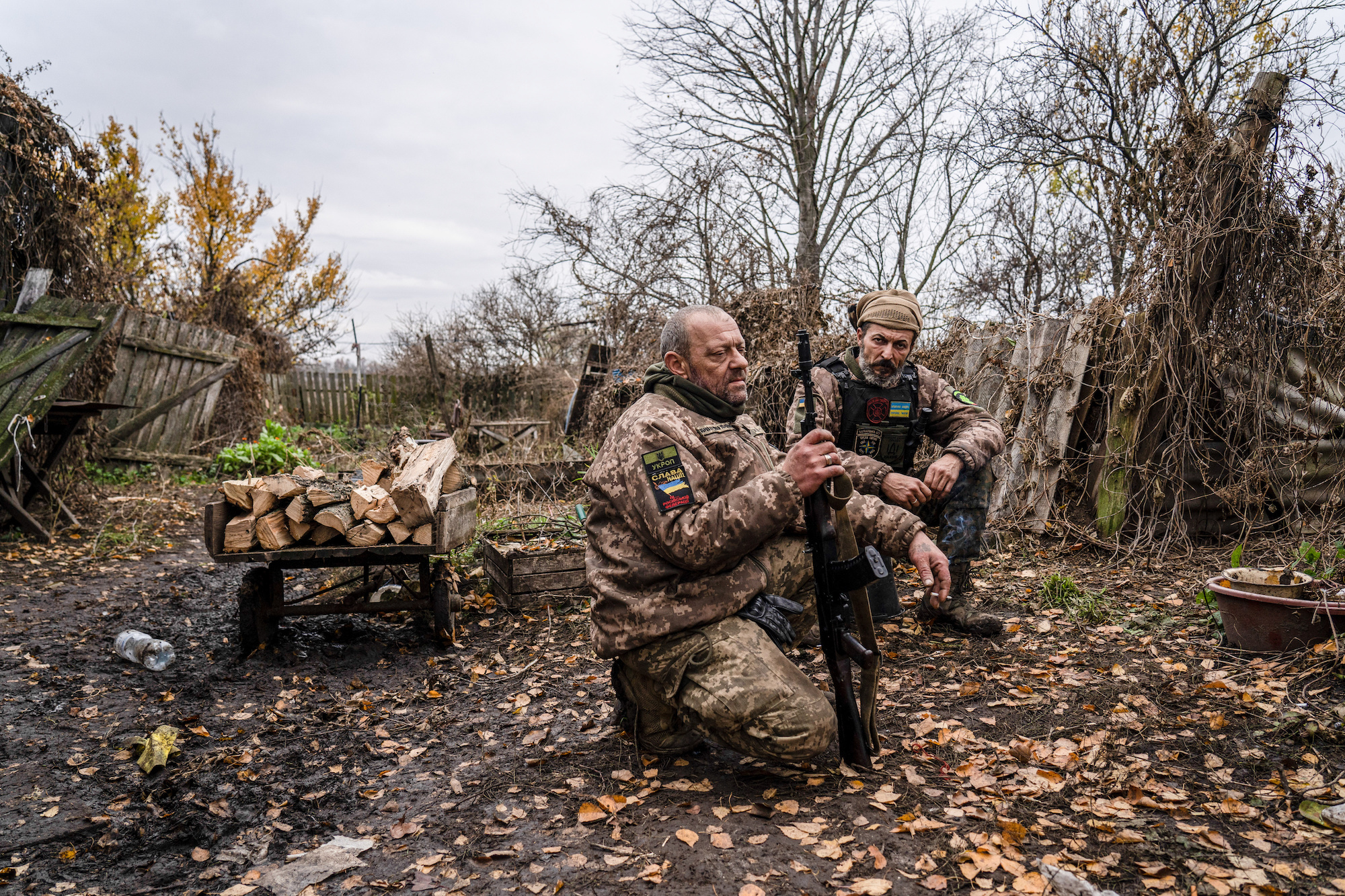 Two Ukrainian soldiers wait for evacuation at a medical point in the area of Svatove and Kreminna, Luhansk region, on November 4.