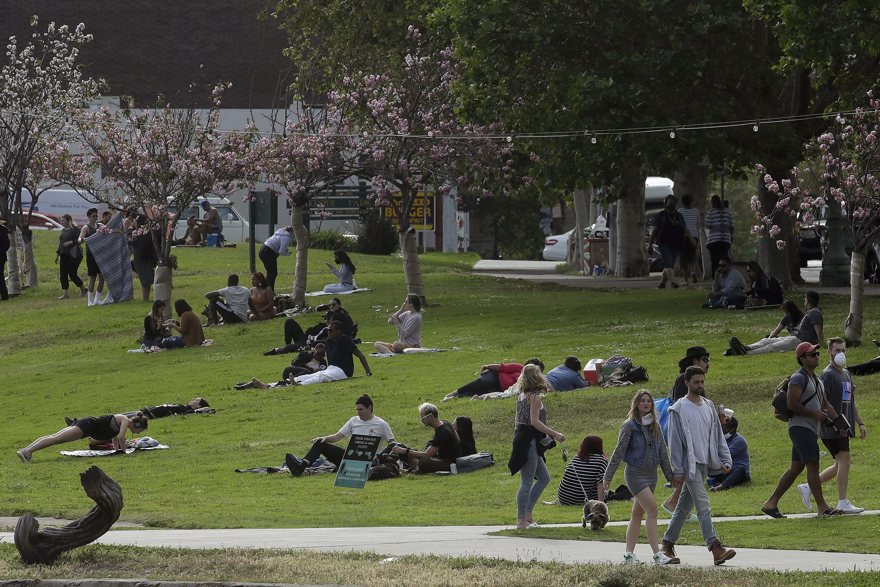 People visit Lake Merritt in Oakland, California, on May 16.