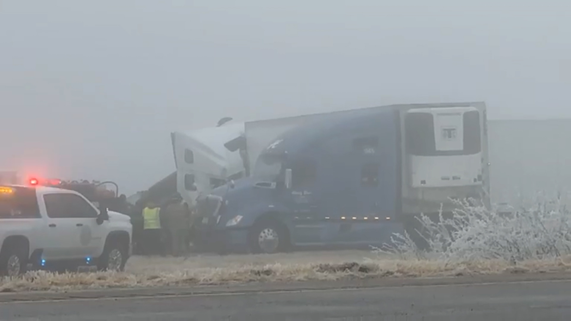 Semi-trucks are seen piled up on a highway in Reeves County, Texas, on January 31.