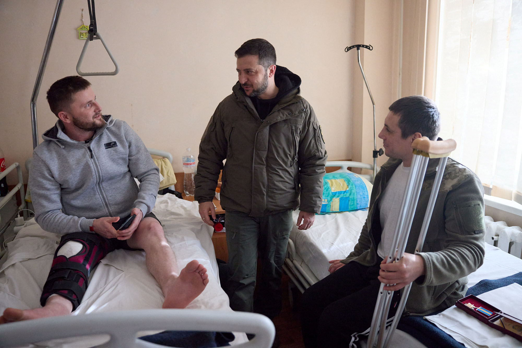 Ukraine's President Volodymyr Zelensky visits service members at a hospital on the Day of the Ukrainian Armed Forces in Kharkiv, Ukraine, on December 6.