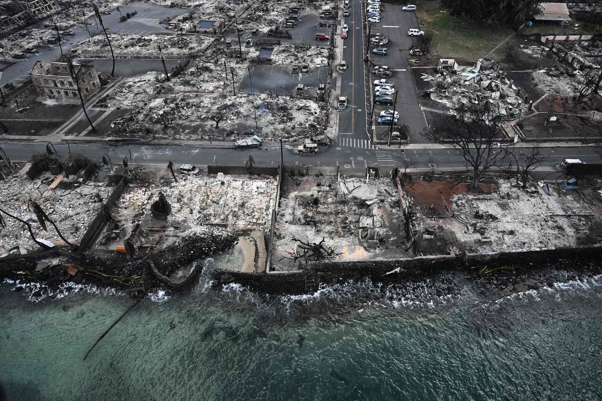 An aerial image shows destroyed homes and buildings burned to the ground in Lahaina on Friday.
