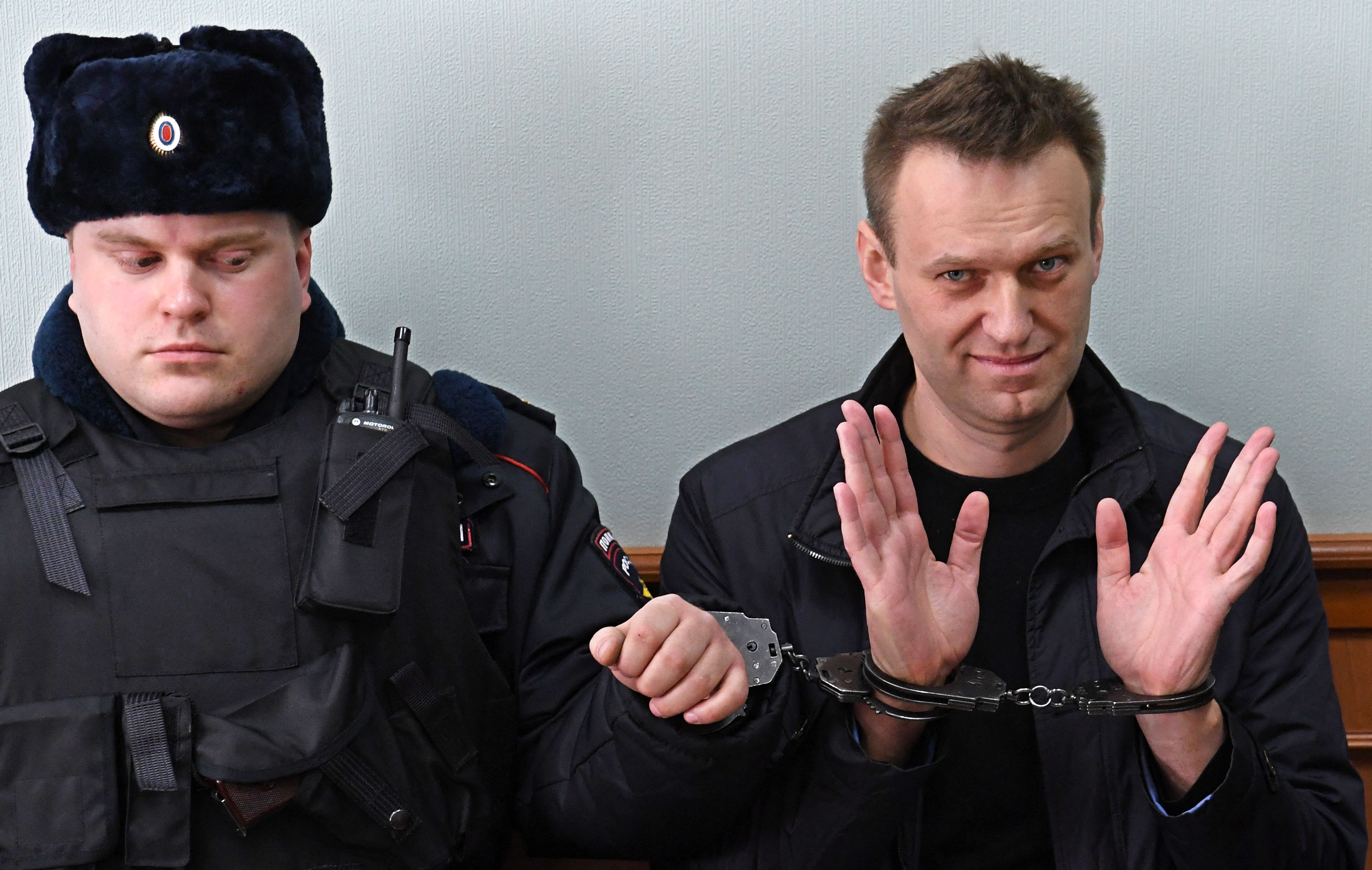 Navalny gestures during an appeal hearing at a court in Moscow in March 2017. He was sentenced to 15 days behind bars for resisting police during the opposition rally.