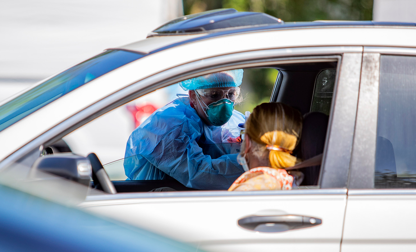 Tidelands Health medical professionals conduct a drive-through Covid-19 testing site on Friday July 17, at Myrtle Beach Pelicans Ballpark in Myrtle Beach, South Carolina.