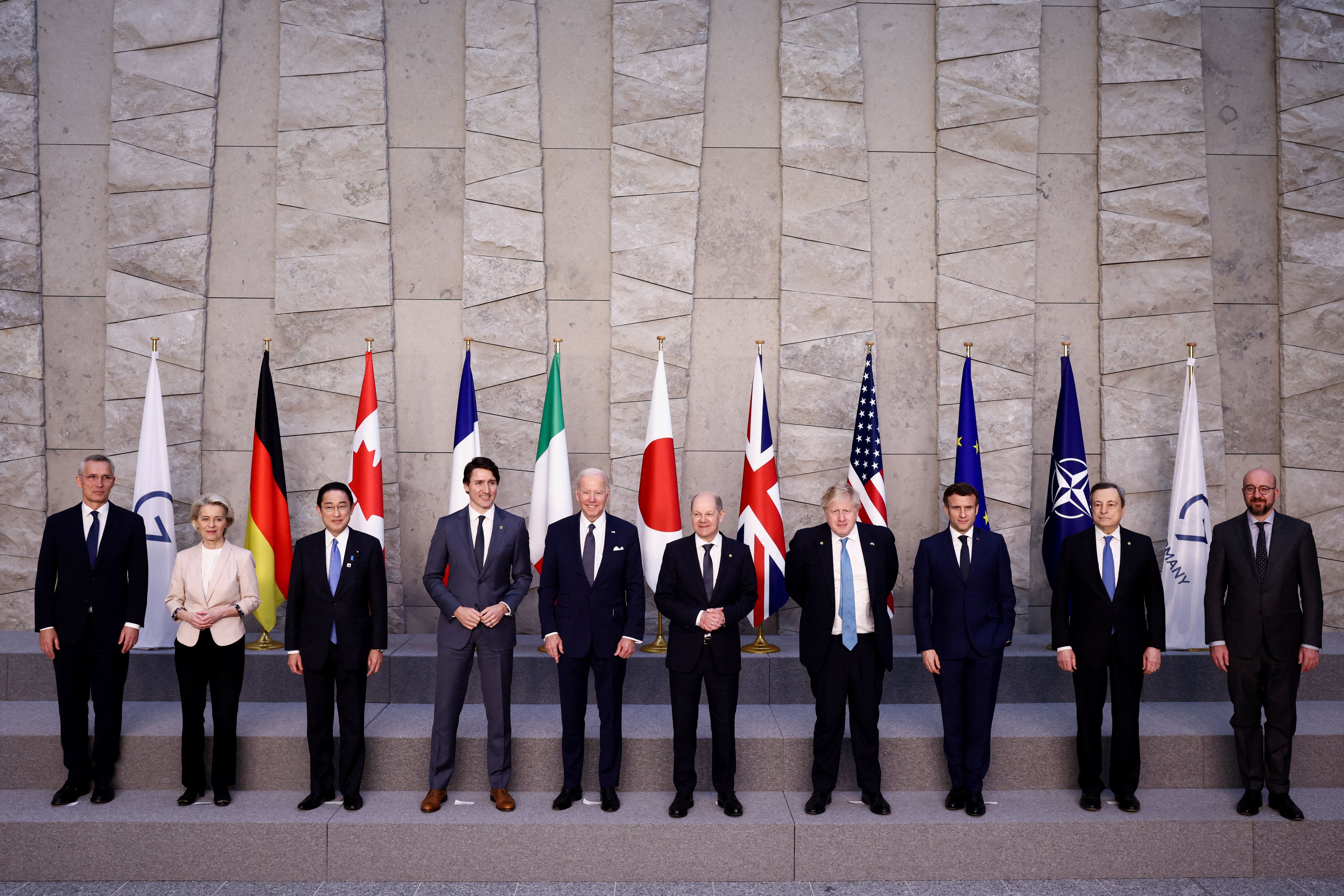 Left to right: NATO Secretary General Jens Stoltenberg, European Commission President Ursula von der Leyen, Japan's Prime Minister Fumio Kishida, Canada's Prime Minister Justin Trudeau, U.S. President Joe Biden, Germany's Chancellor Olaf Scholz, British Prime Minister Boris Johnson, France's President Emmanuel Macron, Italy's Prime Minister Mario Draghi and European Council President Charles Michel pose for a G7 leaders' family photograph during a NATO summit at the alliance's headquarters in Brussels, Belgium, on March 24. 
