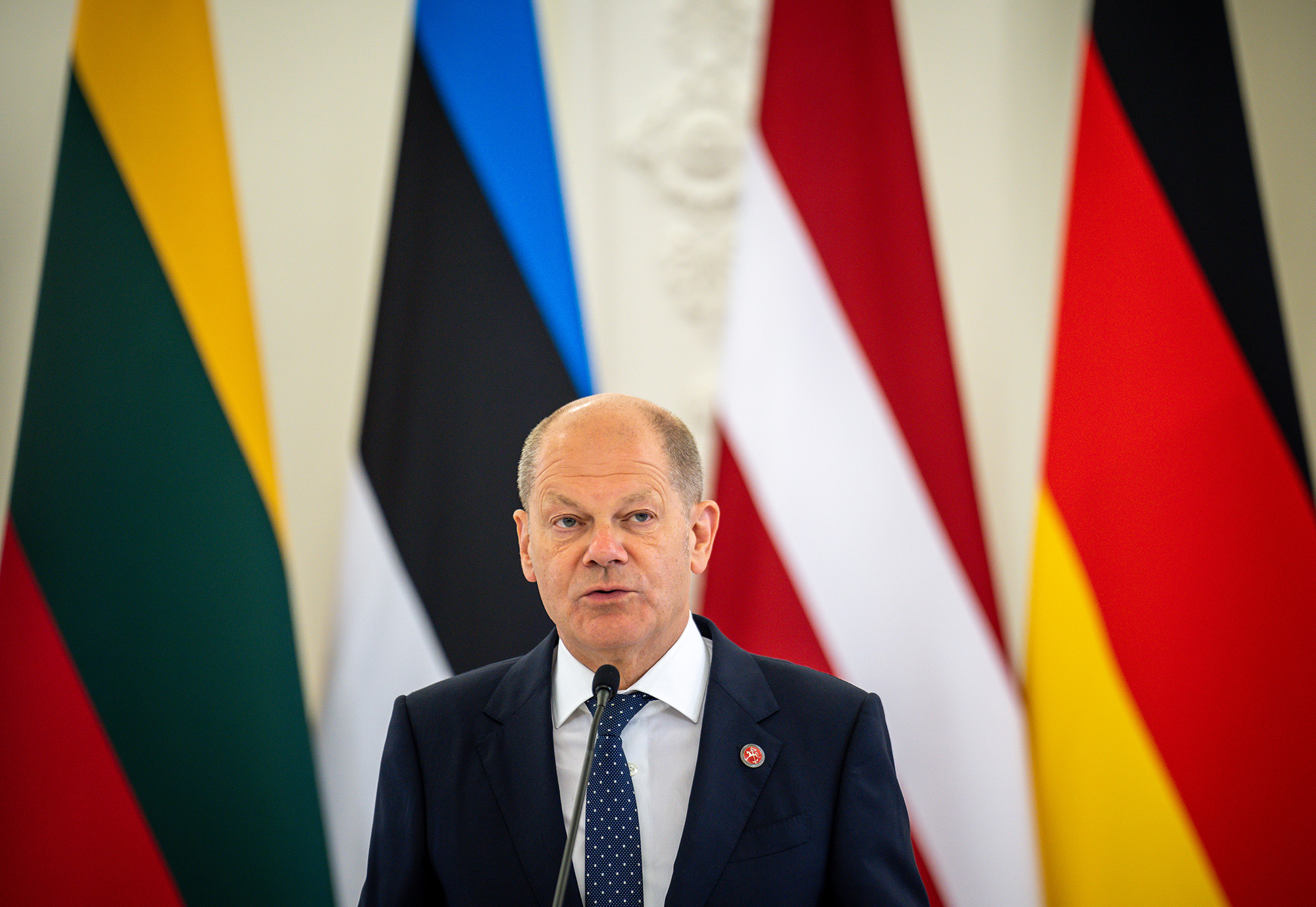 German Chancellor Olaf Scholz speaks at a press conference in Vilnius, Lithuania, on June 7. 