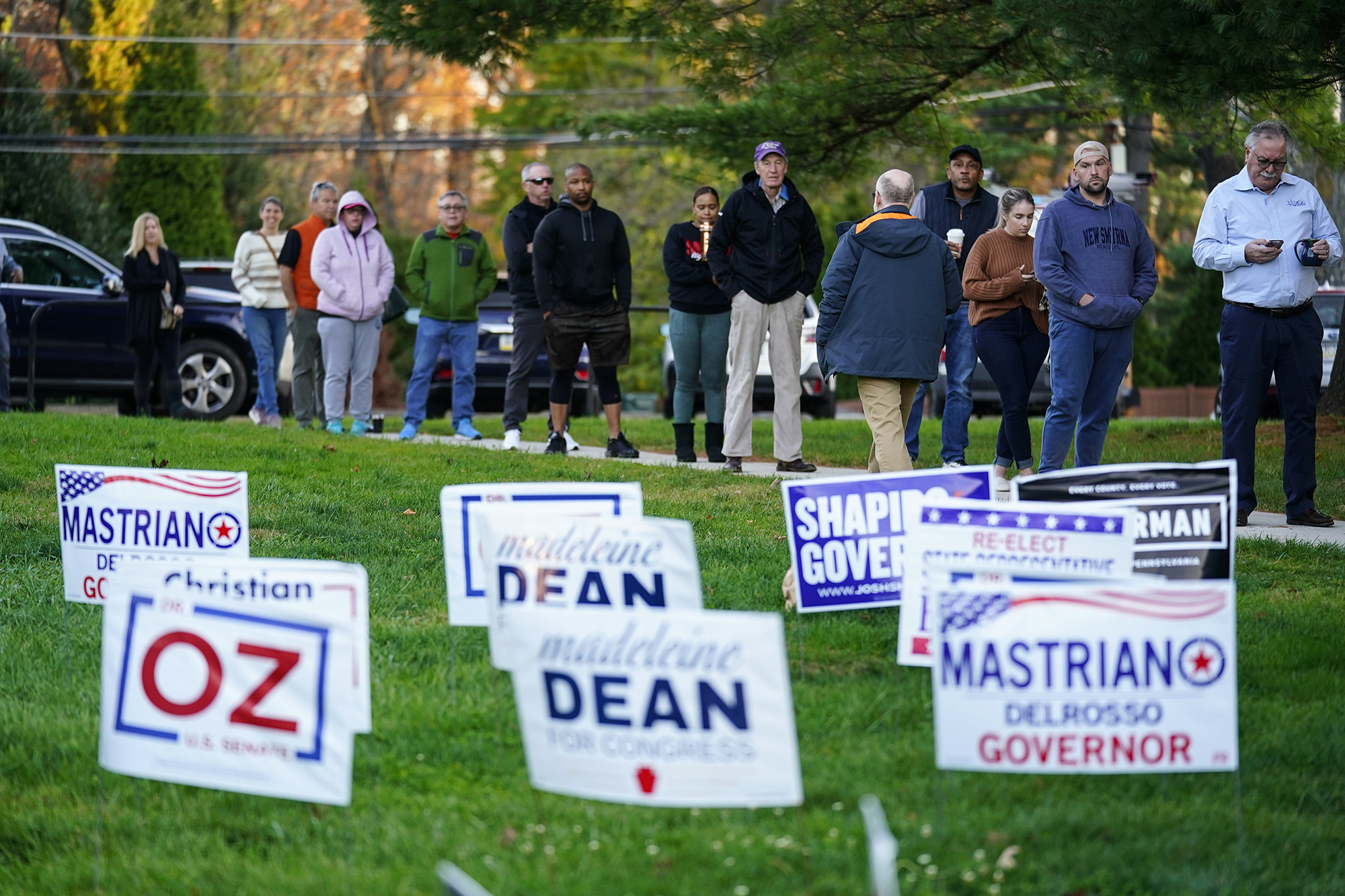 Voters wait in line to cast their ballots in Rydal, Pennsylvania, Tuesday.