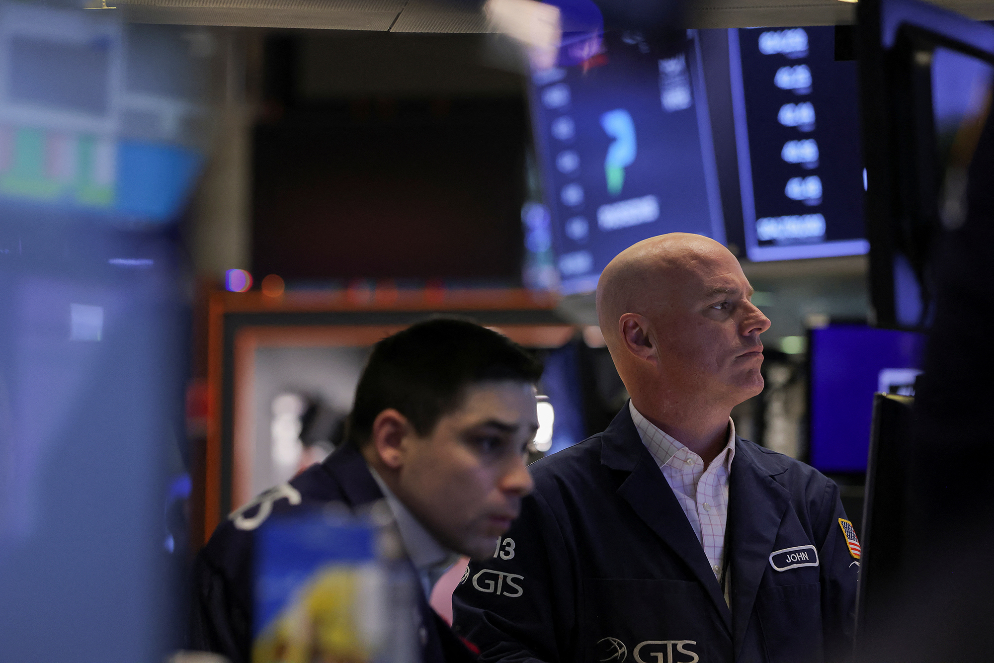 Traders work on the floor of the New York Stock Exchange on March 15.