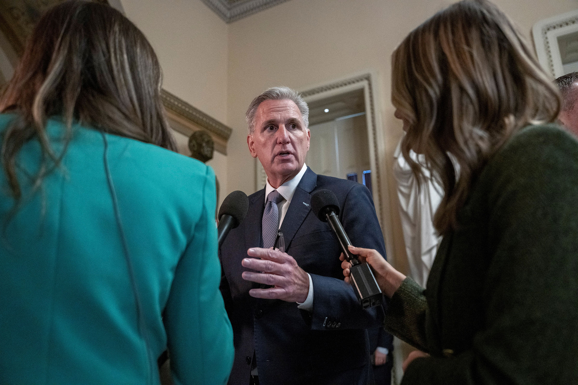 House Speaker Kevin McCarthy speaks to reporters after voting on a motion to adjourn as the deadline to avert a partial government shutdown approaches on Capitol Hill in Washington, DC, on September 30, 2023.