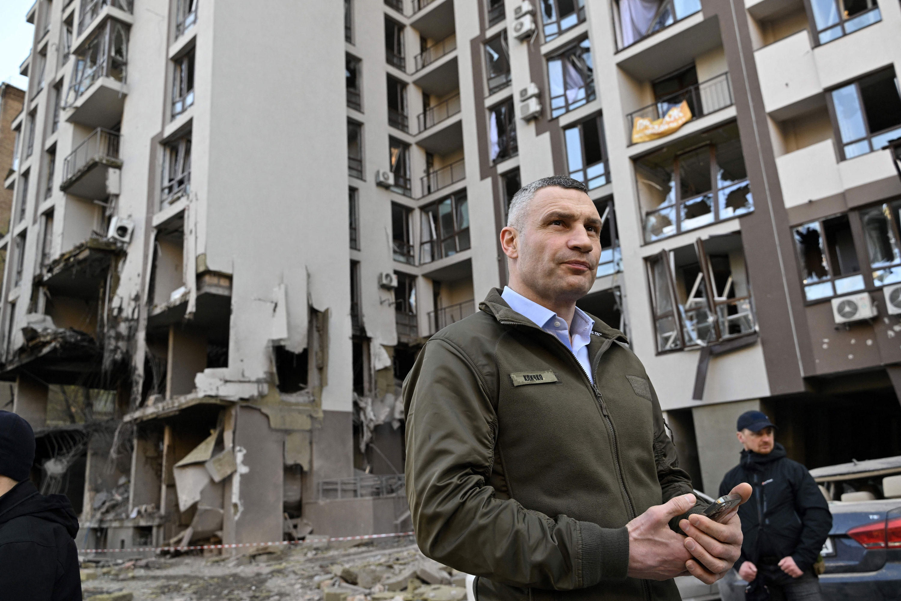 Vitali Klitschko, mayor of Kyiv, stands in front of a damaged building following Russian strikes in Kyiv on April 29