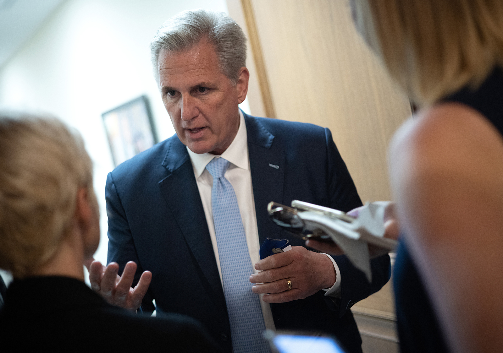 House Minority Leader Kevin McCarthy speaks with reporters after voting on the establishment of a commission to investigate the events of January 6 on May 19, in Washington, DC.