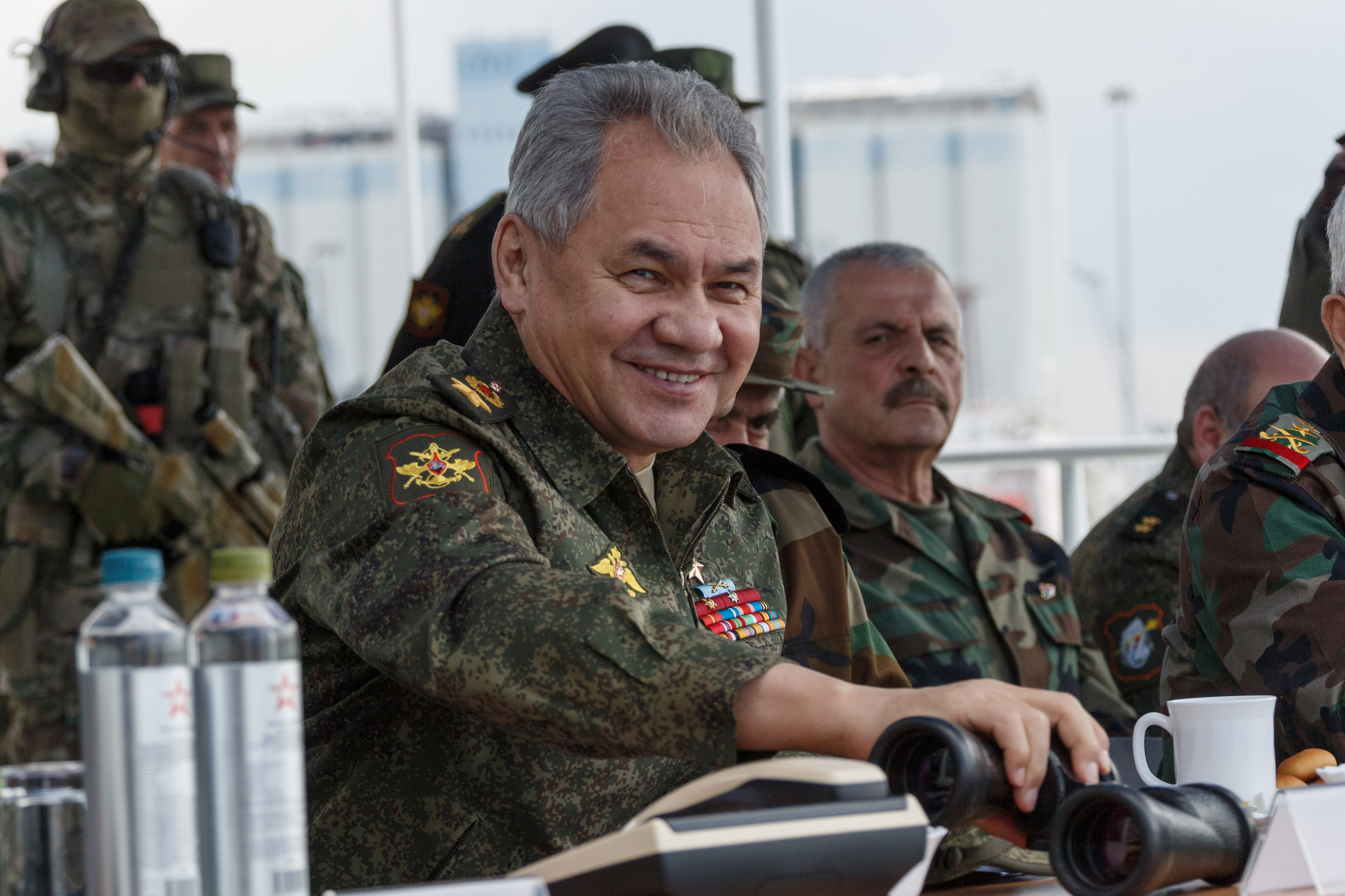 Russia's Defence Minister Sergei Shoigu watches the Russian Navy hold drills in the Mediterranean Sea on February 15.