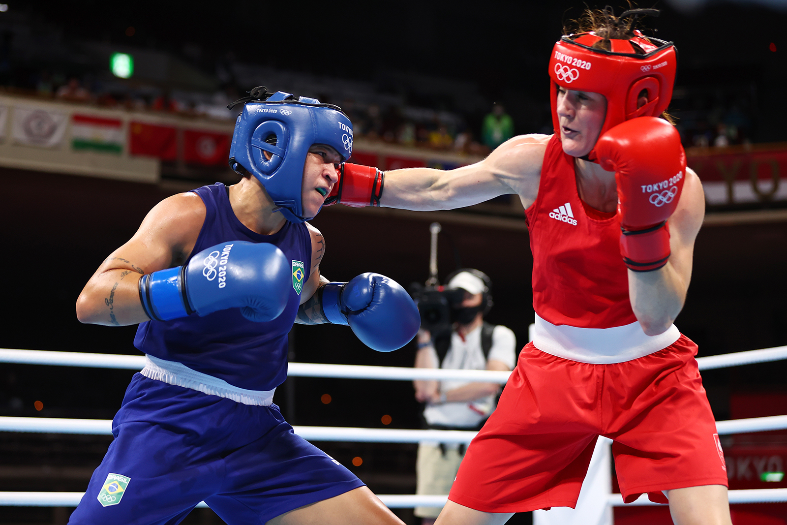 Irish boxer Kellie Anne Harrington, right, punches Brazil's Beatriz Ferreira during their lightweight gold medal match on Sunday.