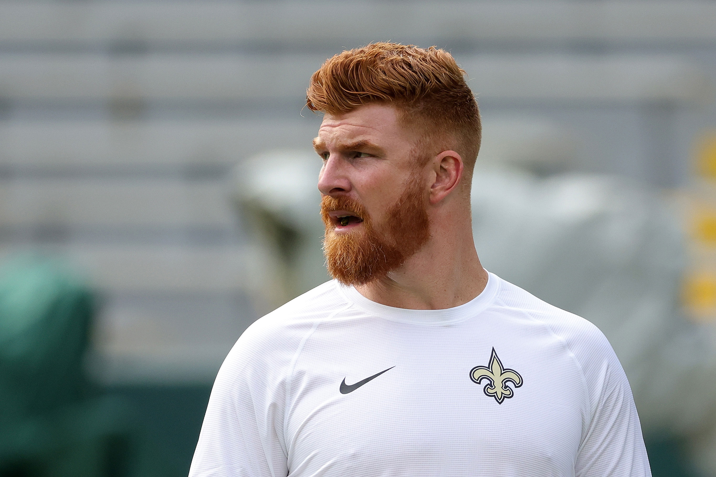 Andy Dalton of the New Orleans Saints participates in warmups August 19. 