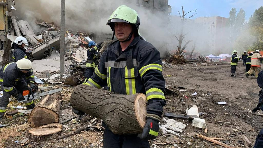 More than 200 rescuers sifted through rubble in Zaporizhzhia Sunday after Russian missile strikes.