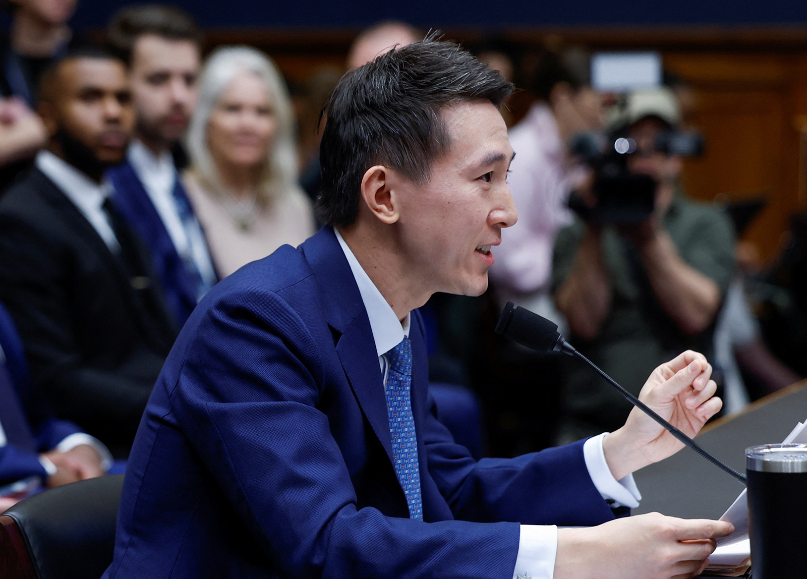 TikTok Chief Executive Shou Zi Chew testifying before a House Energy and Commerce Committee hearing on Capitol Hill today.