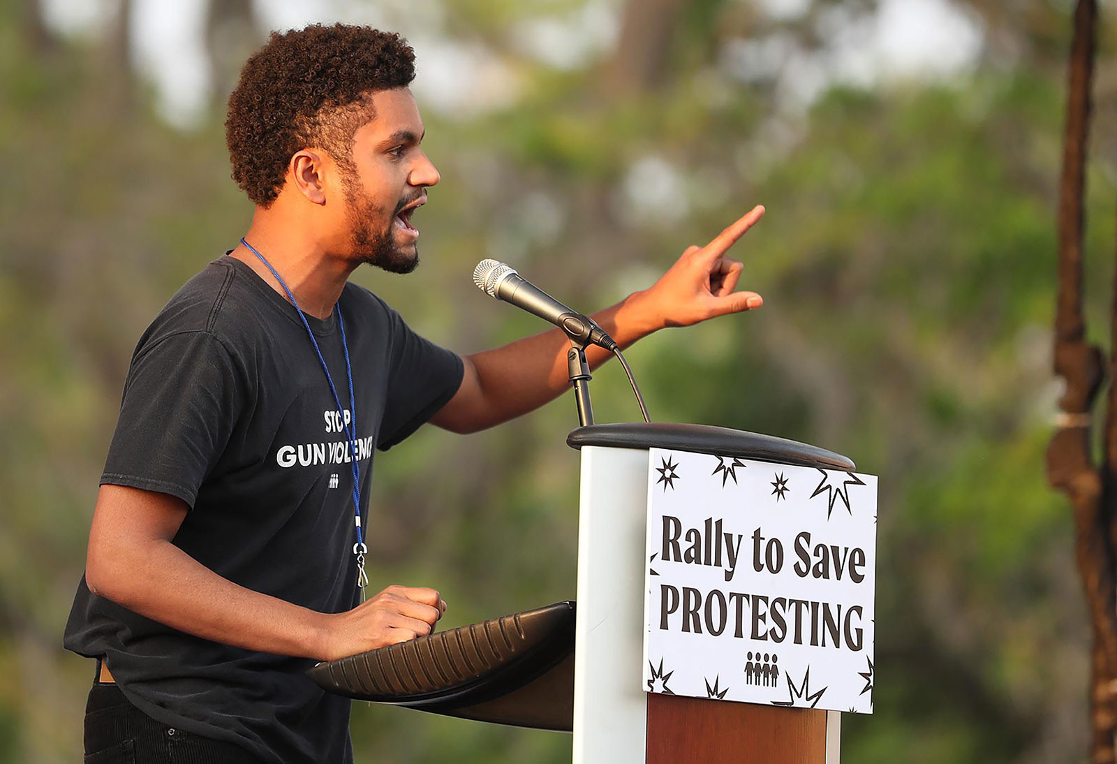 Maxwell Frost, a gun violence prevention activist, speaks during a March For Our Lives drive-in rally and aid event in Orlando in 2021.