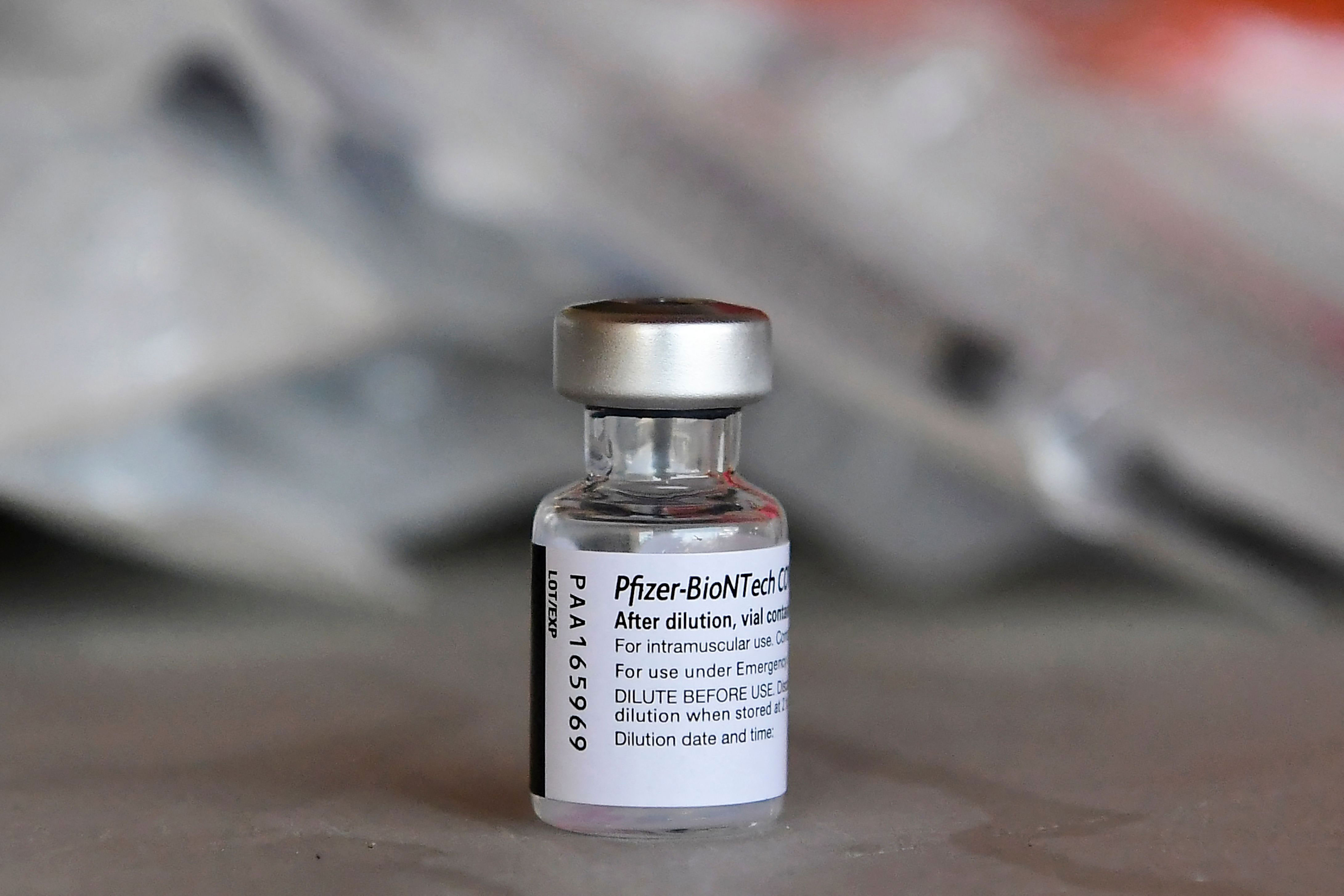 A Pfizer Covid-19 vaccine vial is pictured at a mobile clinic in Los Angeles on July 9, 2021.