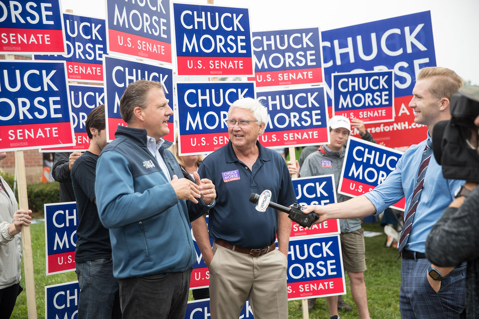 New Hampshire Governor Chris Sununu and Chuck Morse speak to the media at a polling place on September 13 in Bedford, New Hampshire. 