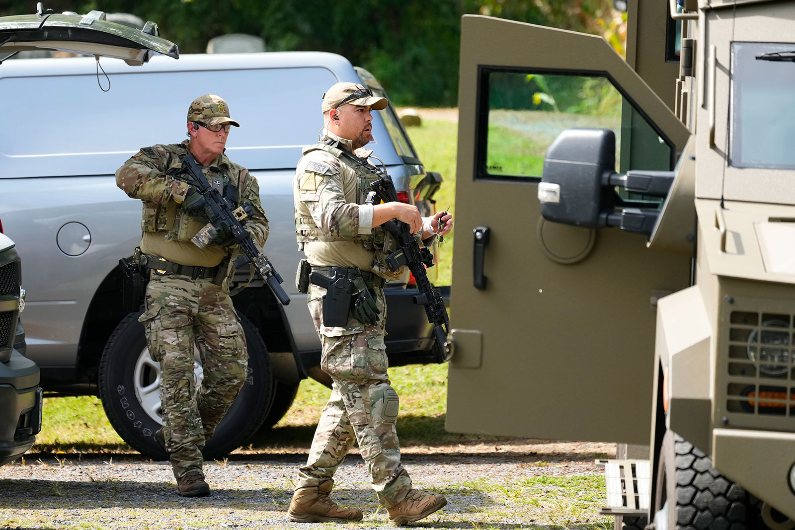 Law enforcement officers gather as they search for escaped convict Danelo Cavalcante in Glenmoore, Pennsylvania, on September 11.
