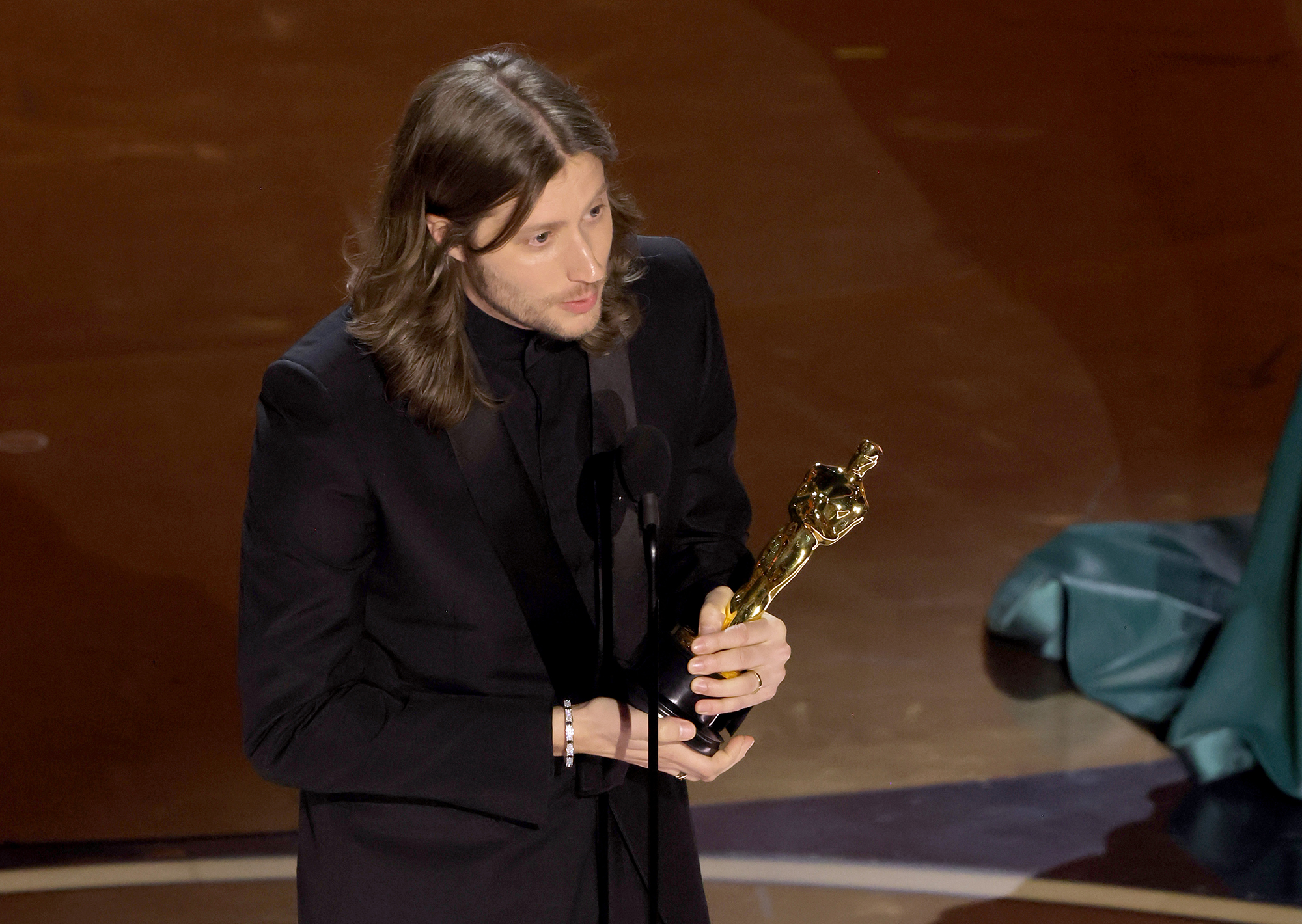Ludwig Göransson accepts the best original score Oscar for "Oppenheimer.”  