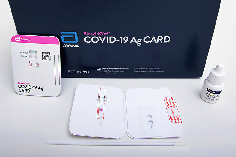This image provided by Abbott Laboratories in August 2020 shows the company's BinaxNOW rapid COVID-19 nasal swab test. 