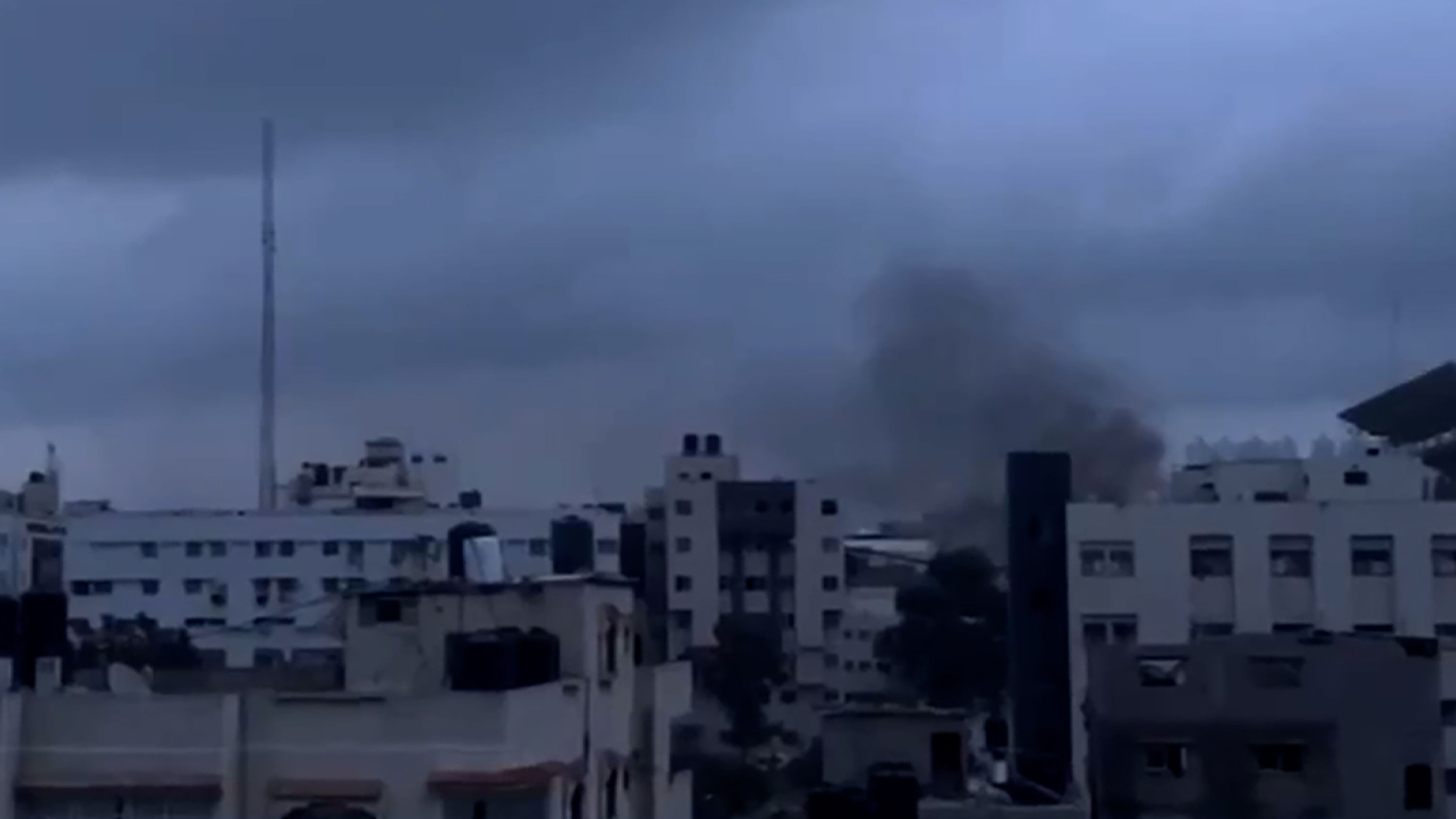 Smoke is seen billowing in the vicinity of the Al-Shifa hospital complex in Gaza on March 18.