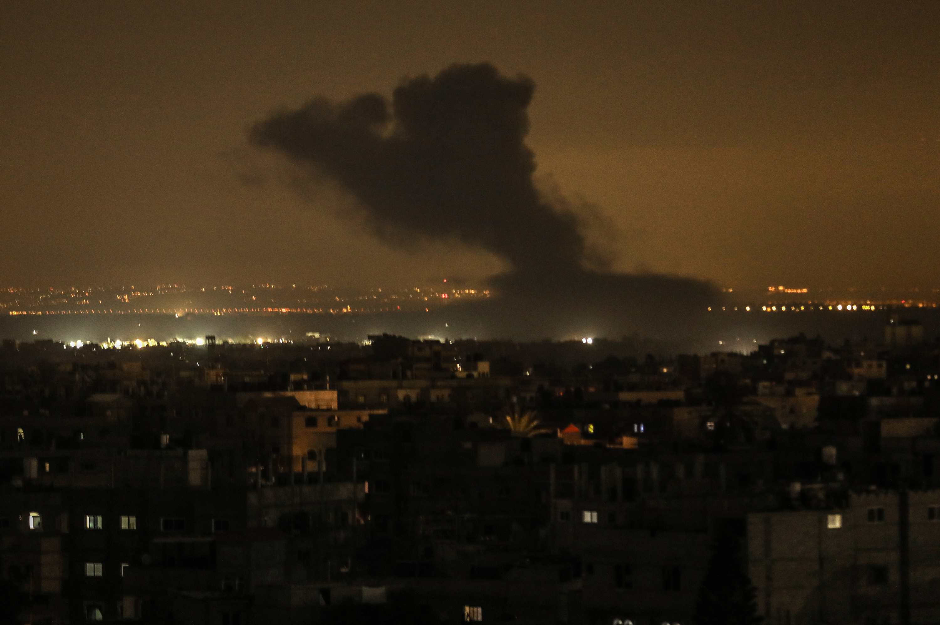 Smoke rises as a result of Israeli attacks in Khan Younis, Gaza on December 29.