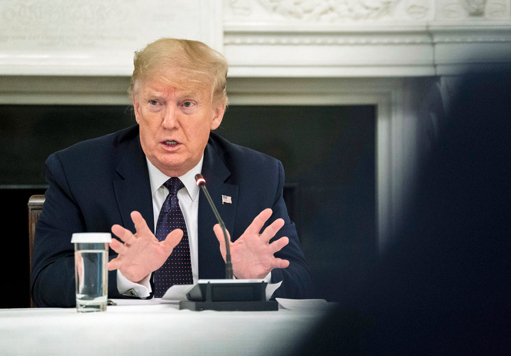 US President Donald Trump speaks during a roundtable in the State Dining Room of the White House May 18, in Washington, DC. 