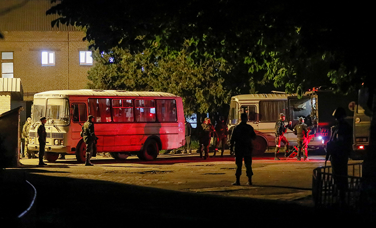 Buses carrying service members of Ukrainian forces from the besieged Azovstal steel mill in Mariupol, which arrived under escort of the pro-Russian military in Novoazovsk, Ukraine on Monday, May 16