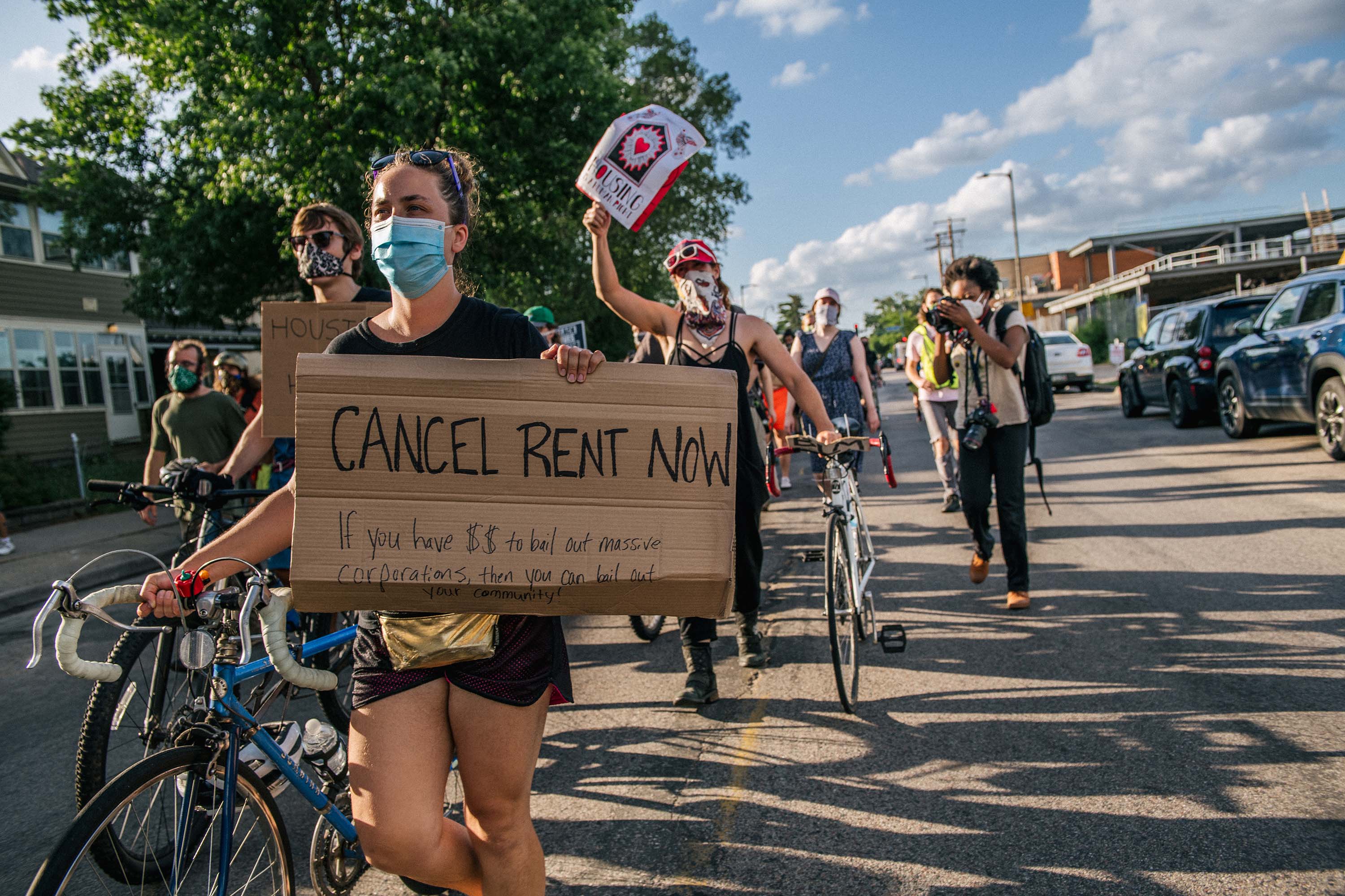 Demonstrators march in the street during the Cancel Rent and Mortgages rally in Minneapolis, Minnesota on June 30.