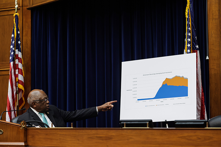 Oversight and Reform Subcommittee Chairman James E. Clyburn points to a sign displaying information on unemployment in the United States, during the House Select Subcommittee on the Coronavirus Crisis on Capitol Hill in Washington, DC, on September 1, 2020. 