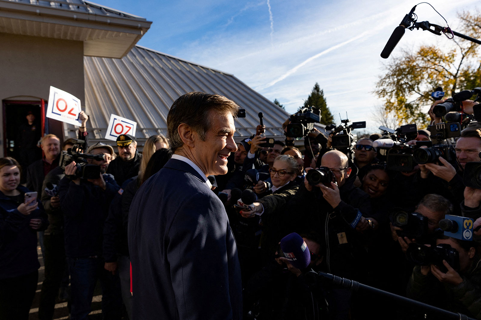 Mehmet Oz speaks to members of the media after voting in Bryn Athyn, Pennsylvania, on Tuesday. 