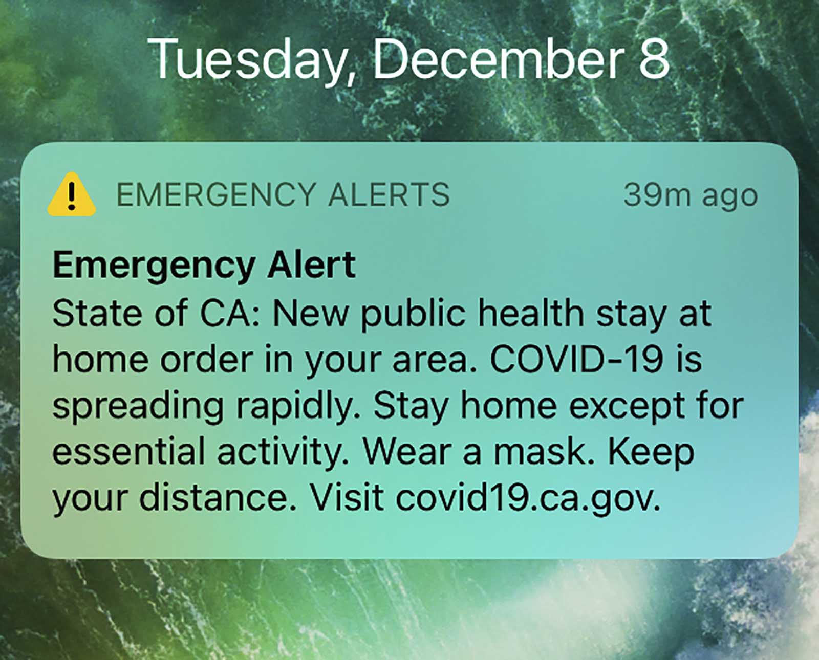 California authorities sent this cell phone text alert to two major regions of the state on Tuesday, December 8, to notify people that the coronavirus is spreading rapidly and advise them to stay home except for essential activities.