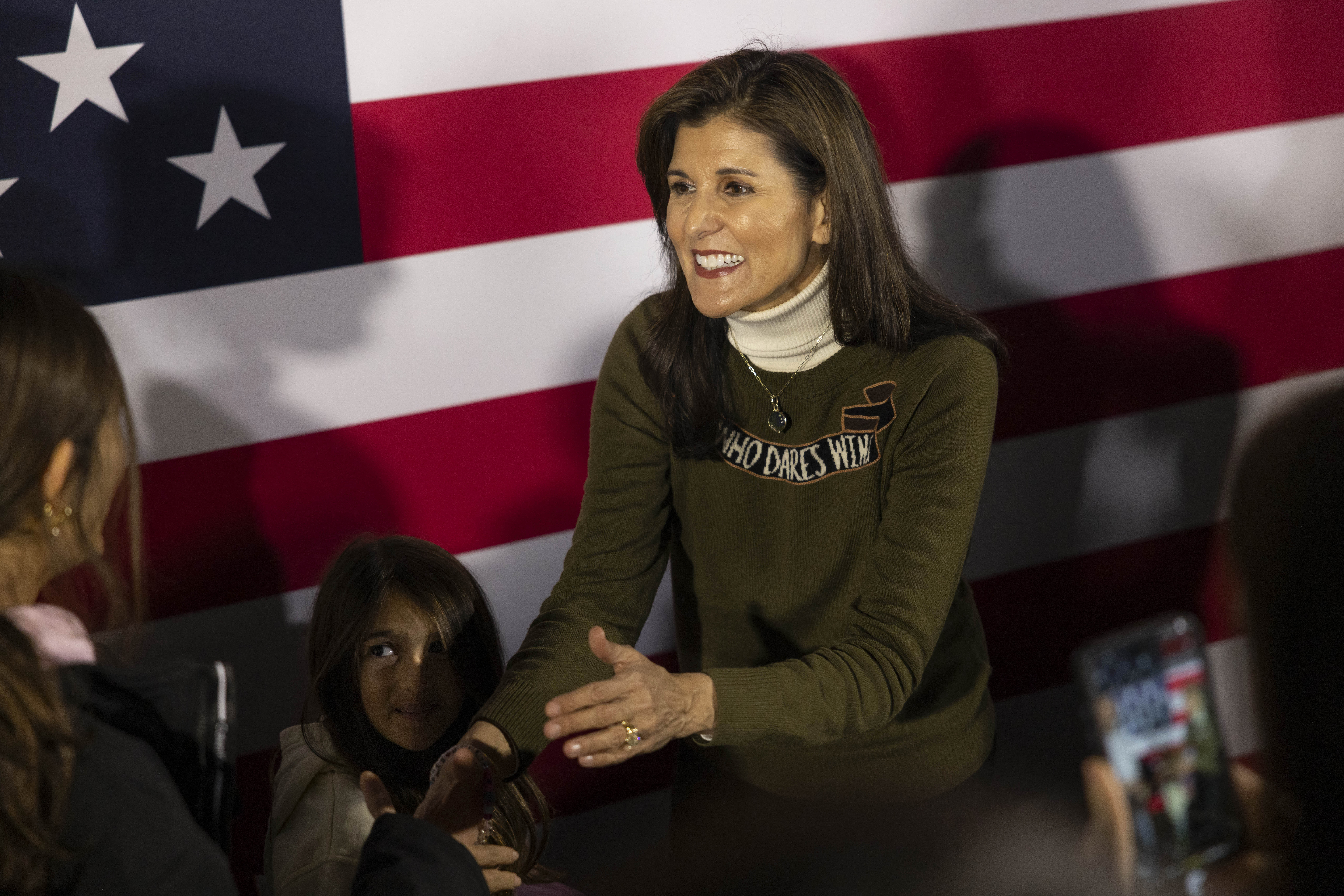 Former South Carolina Gov. Nikki Haley greets her supporters at a campaign event in Iowa City, Iowa, on January 13.