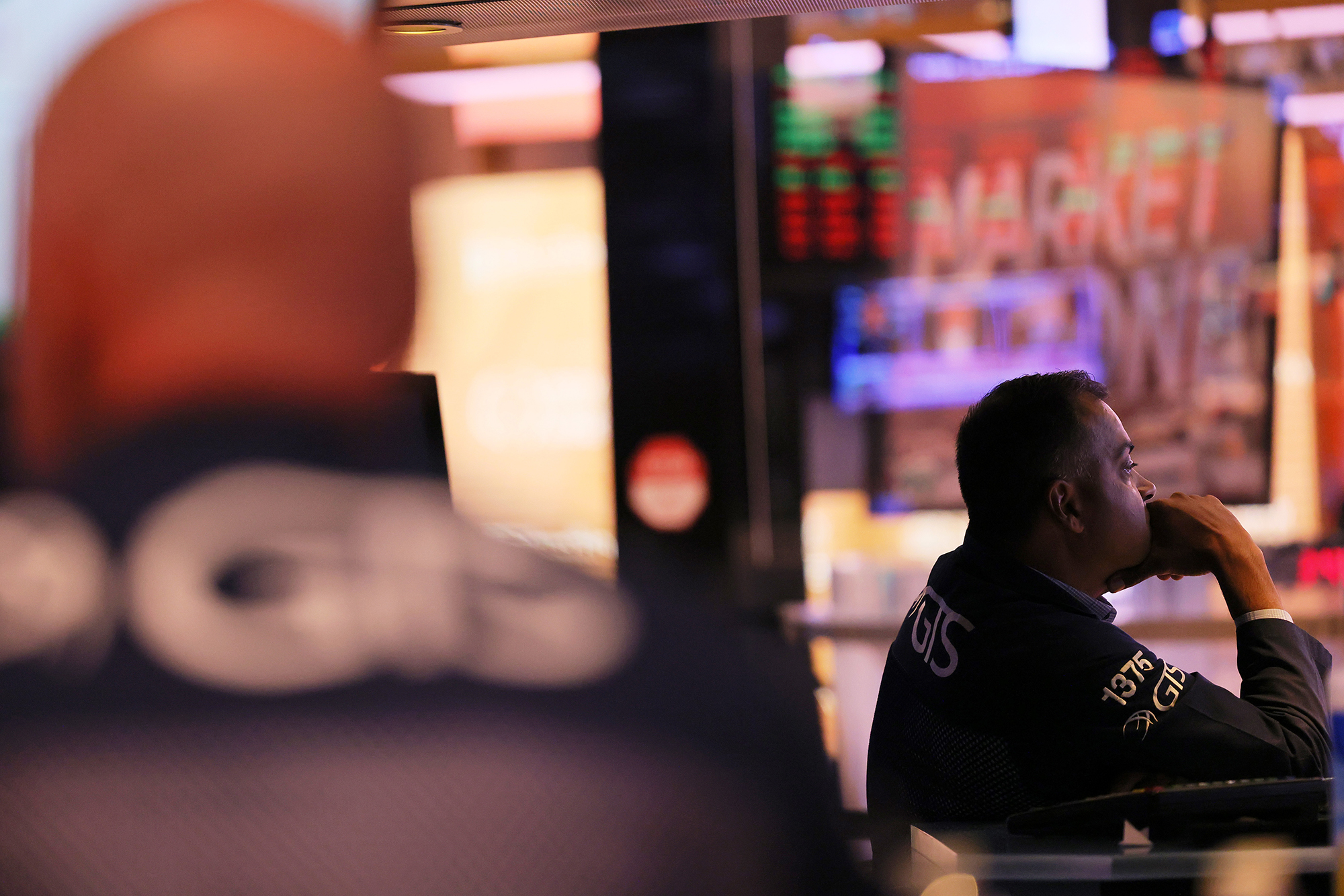 Traders work on the floor of the New York Stock Exchange during afternoon trading on August 22.