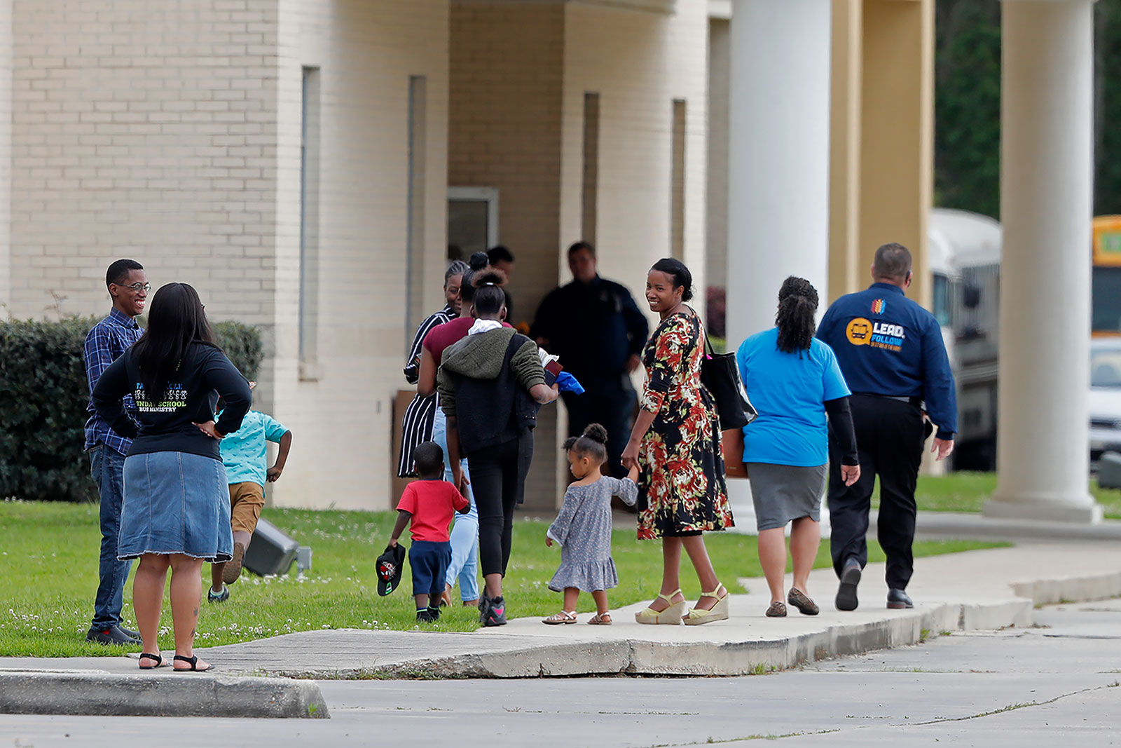 People arrive for church services at the Life Tabernacle Church on Sunday, March 29.