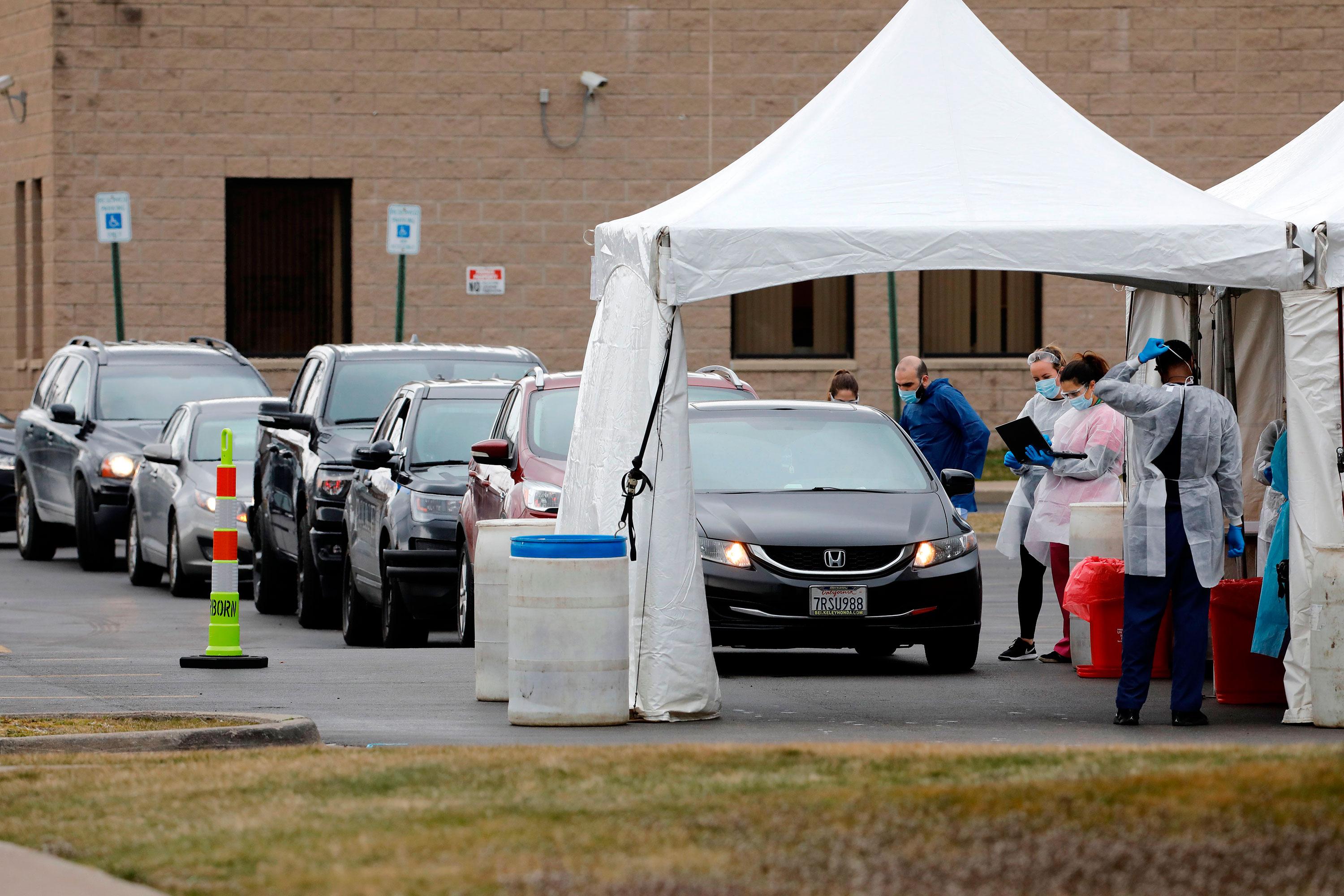People are tested for coronavirus in Dearborn, Michigan on March 26.
