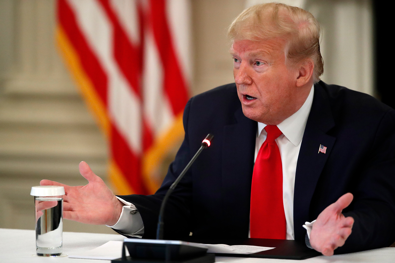 President Donald Trump speaks about reopening the country, during a roundtable with industry executives, in the State Dinning Room of the White House, April 29, in Washington DC.
