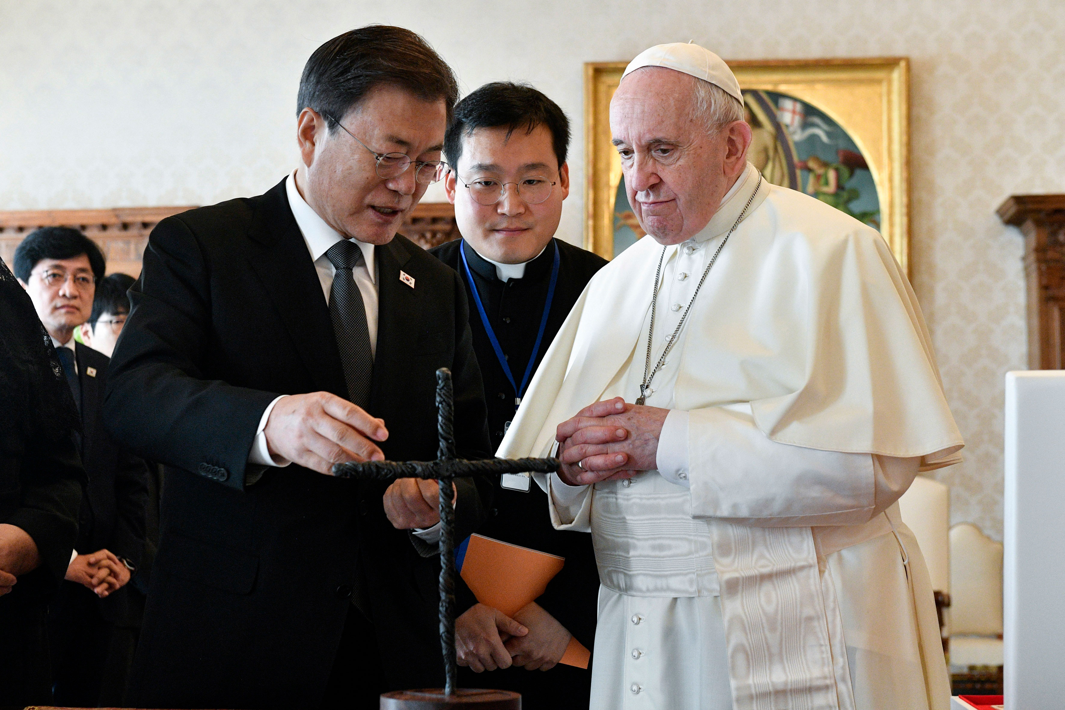 South Korea's President Moon Jae-in exchanges gifts with Pope Francis as they meet at the Vatican on October 29.