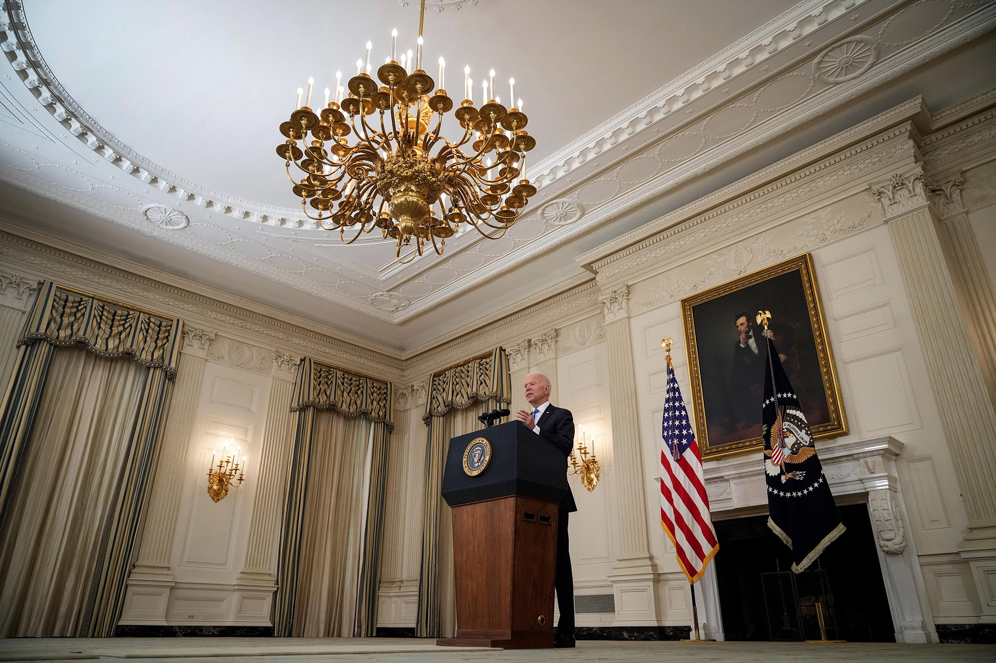 President Biden speaks about the nation's economic recovery on Monday in the State Dining Room of the White House.