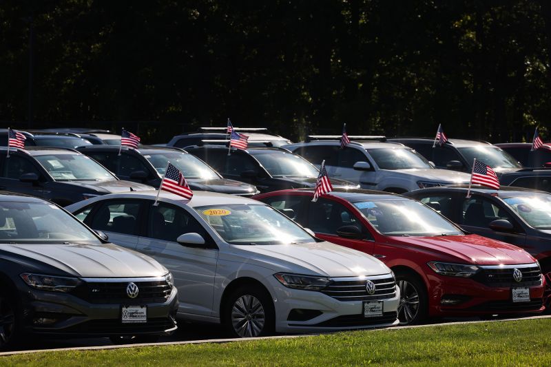 Vehicles for sale at a dealership lot in St. James, New York on Sept. 21.