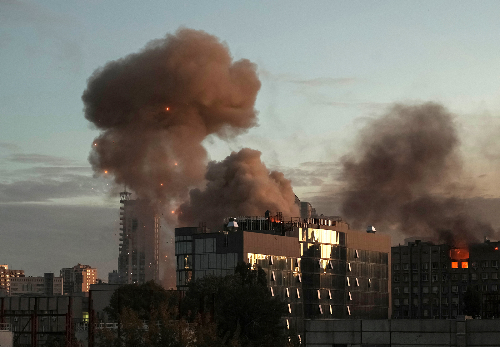 Smoke rises after a Russian drone strike in Kyiv on Monday.