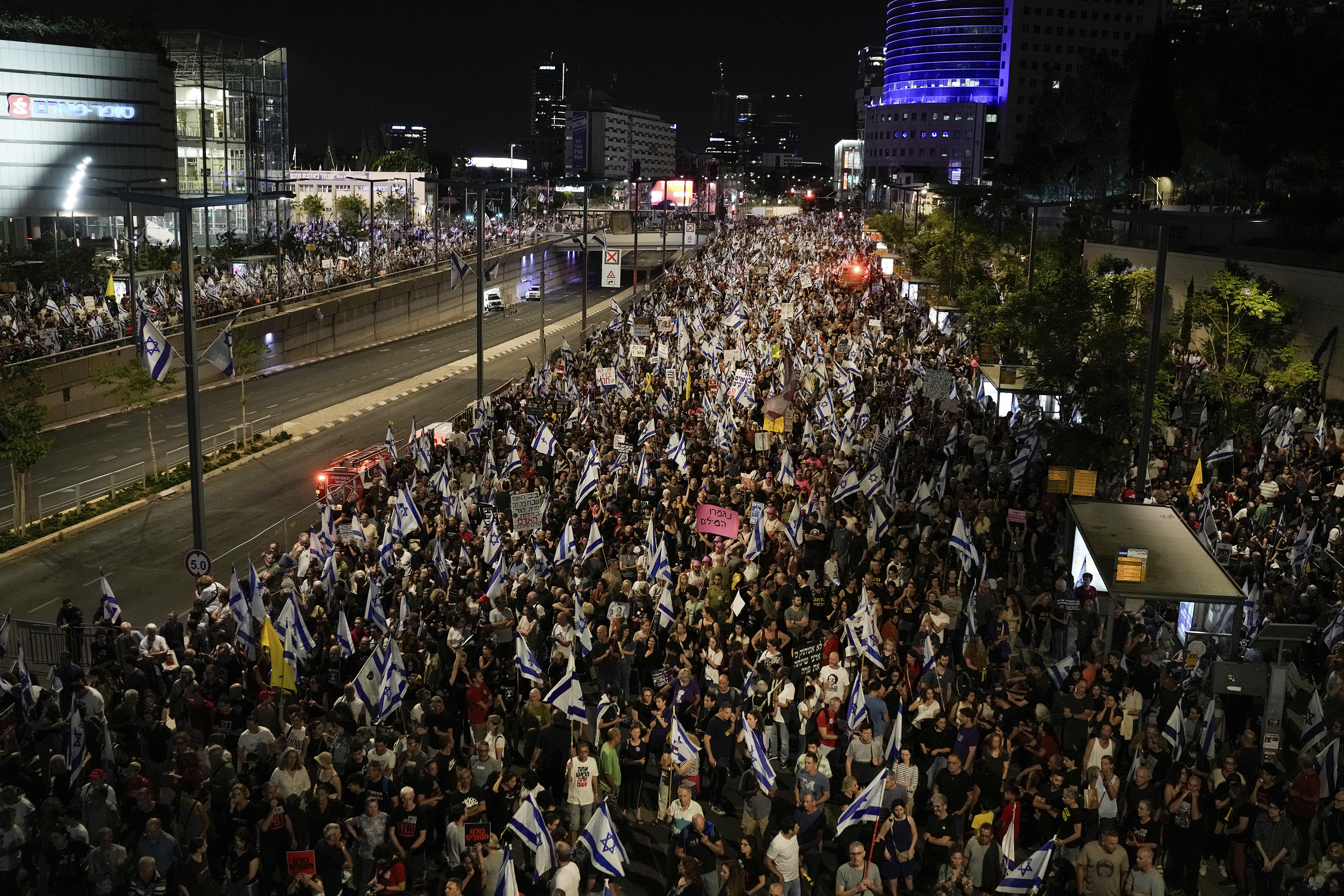People in Tel Aviv, Israel, protest against Prime Minister Benjamin Netanyahu's government and call for the release of hostages held in Gaza on May 18.