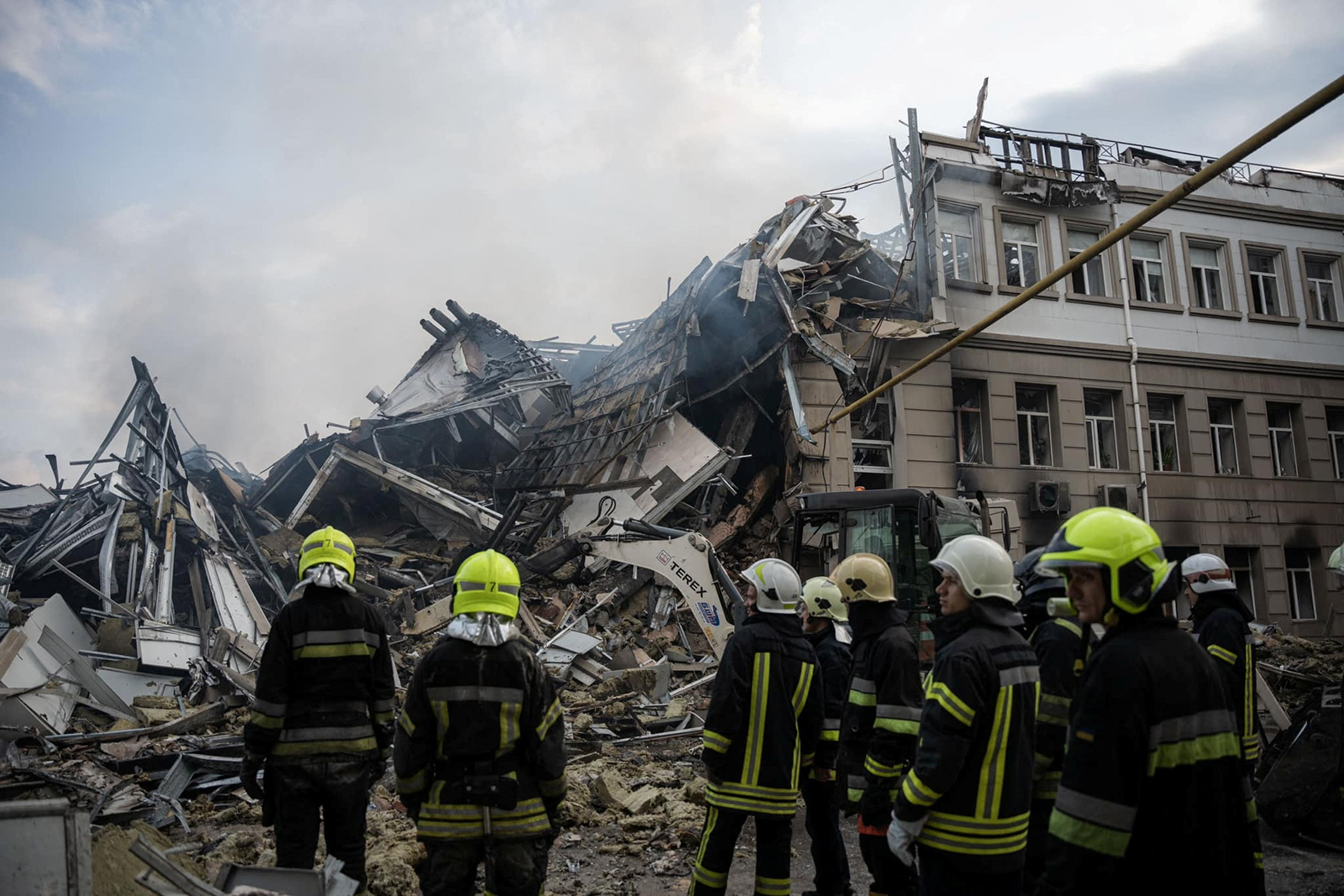 Rescuers work at a site of an administrative building heavily damaged by a Russian missile strike, in Odesa, Ukraine on July 20.