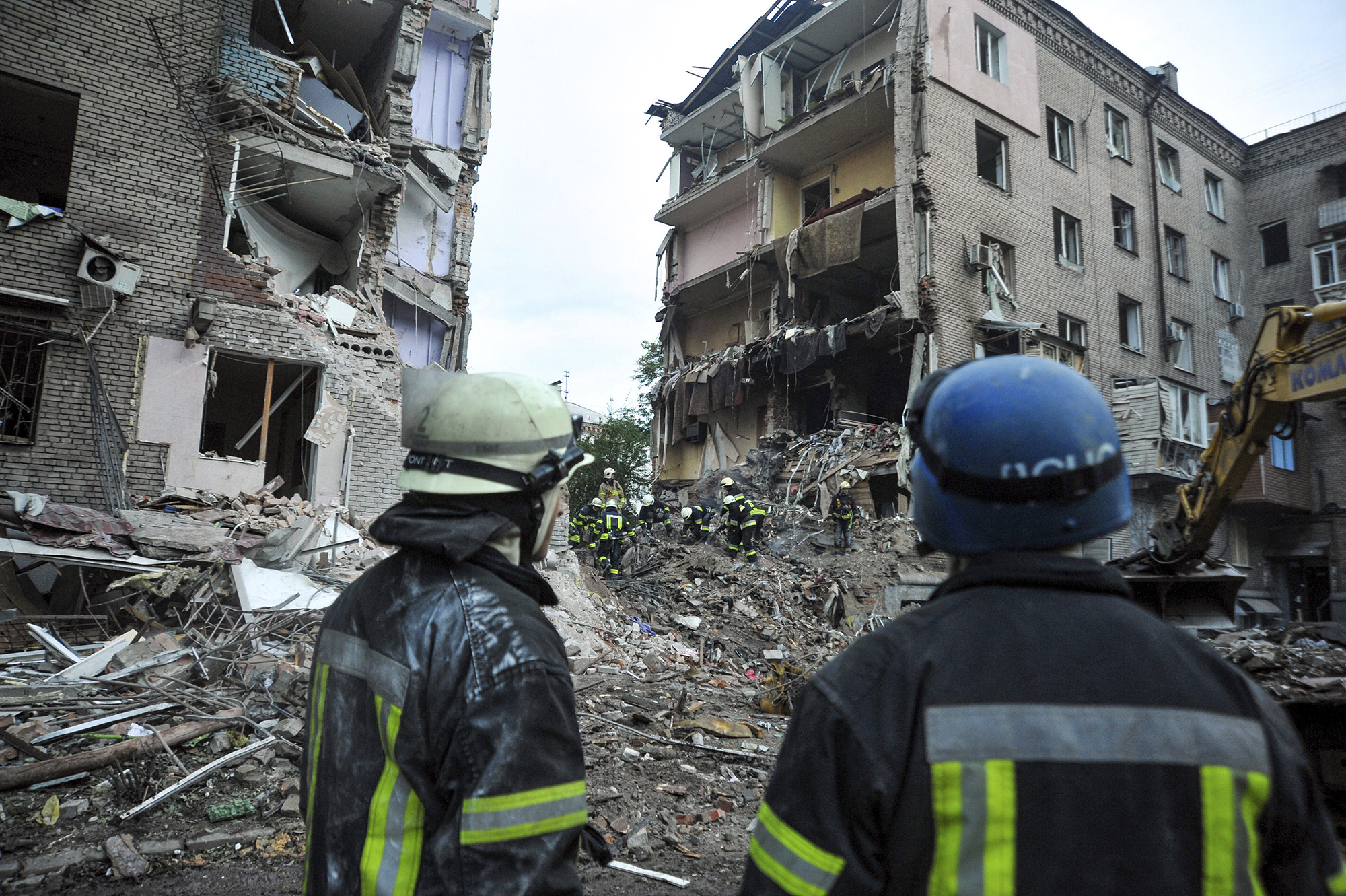 Rescuers at the aftermath of a missile attack in Zaporizhzhia, southeastern Ukraine, on October 11.