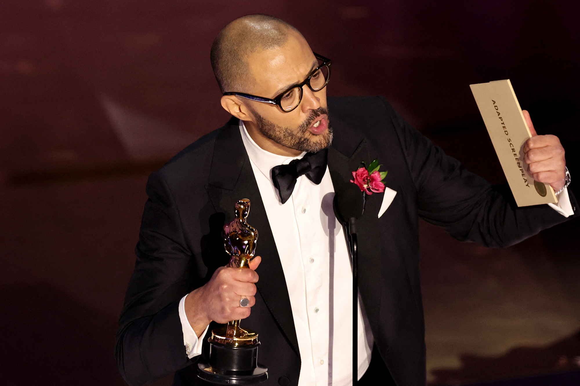 Cord Jefferson accepts the Oscar for best adapted screenplay for "American Fiction.” 