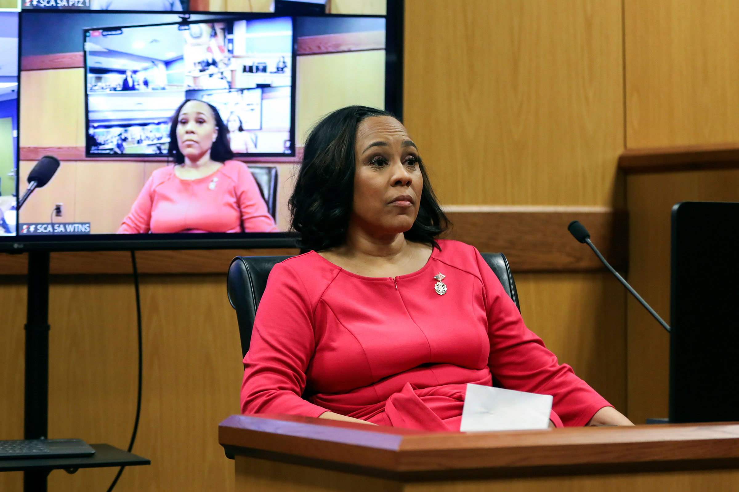 Fulton County District Attorney Fani Willis takes the stand during a hearing on the Georgia election interference case on Thursday in Atlanta.