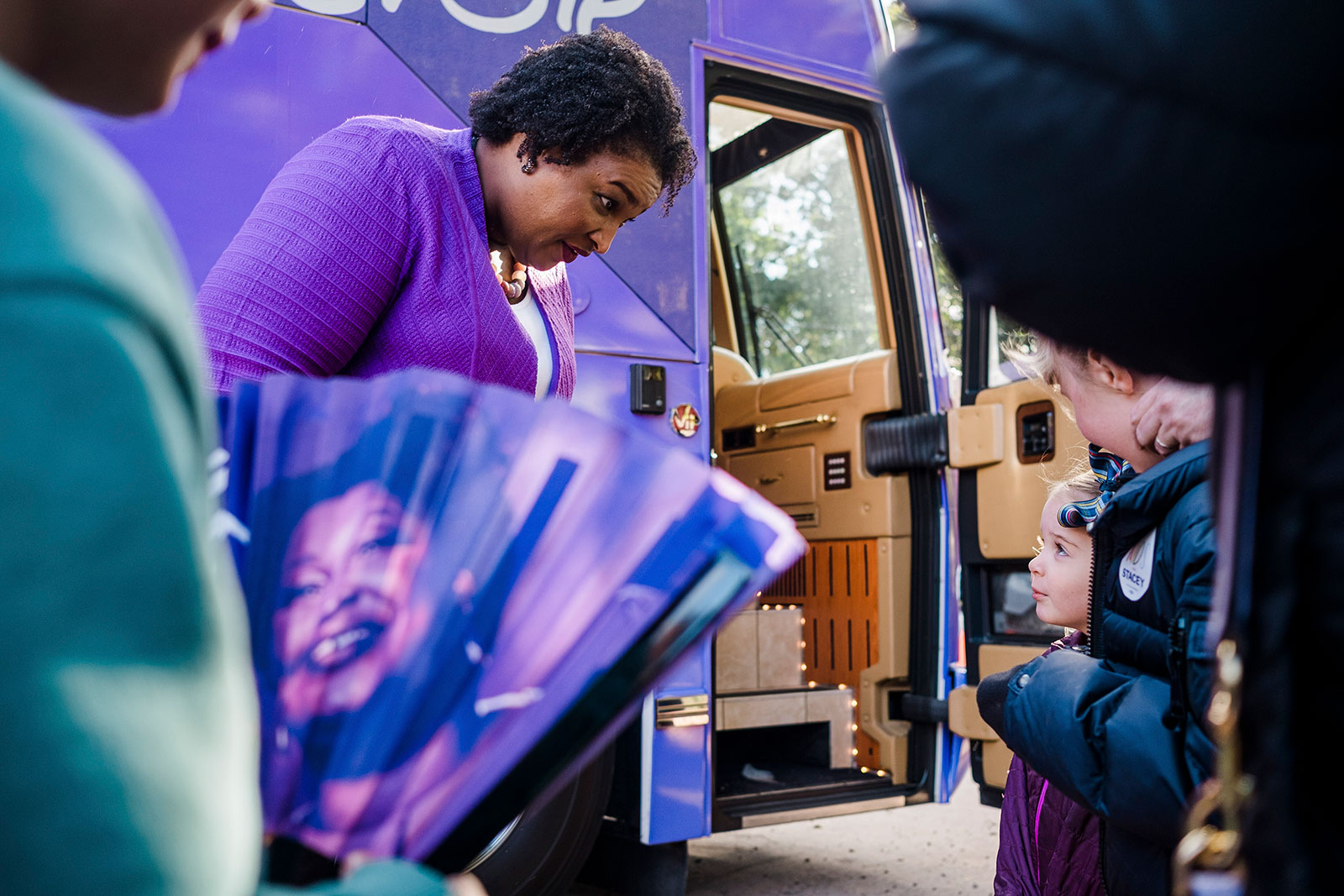 Stacey Abrams, Georgia's Democratic nominee for governor, greets young attendees during a campaign stop in Jonesboro, Georgia, on Oct. 18. The Georgia gubernatorial race is a rematch of 2018, when Republican Brian Kemp narrowly defeated Abrams.