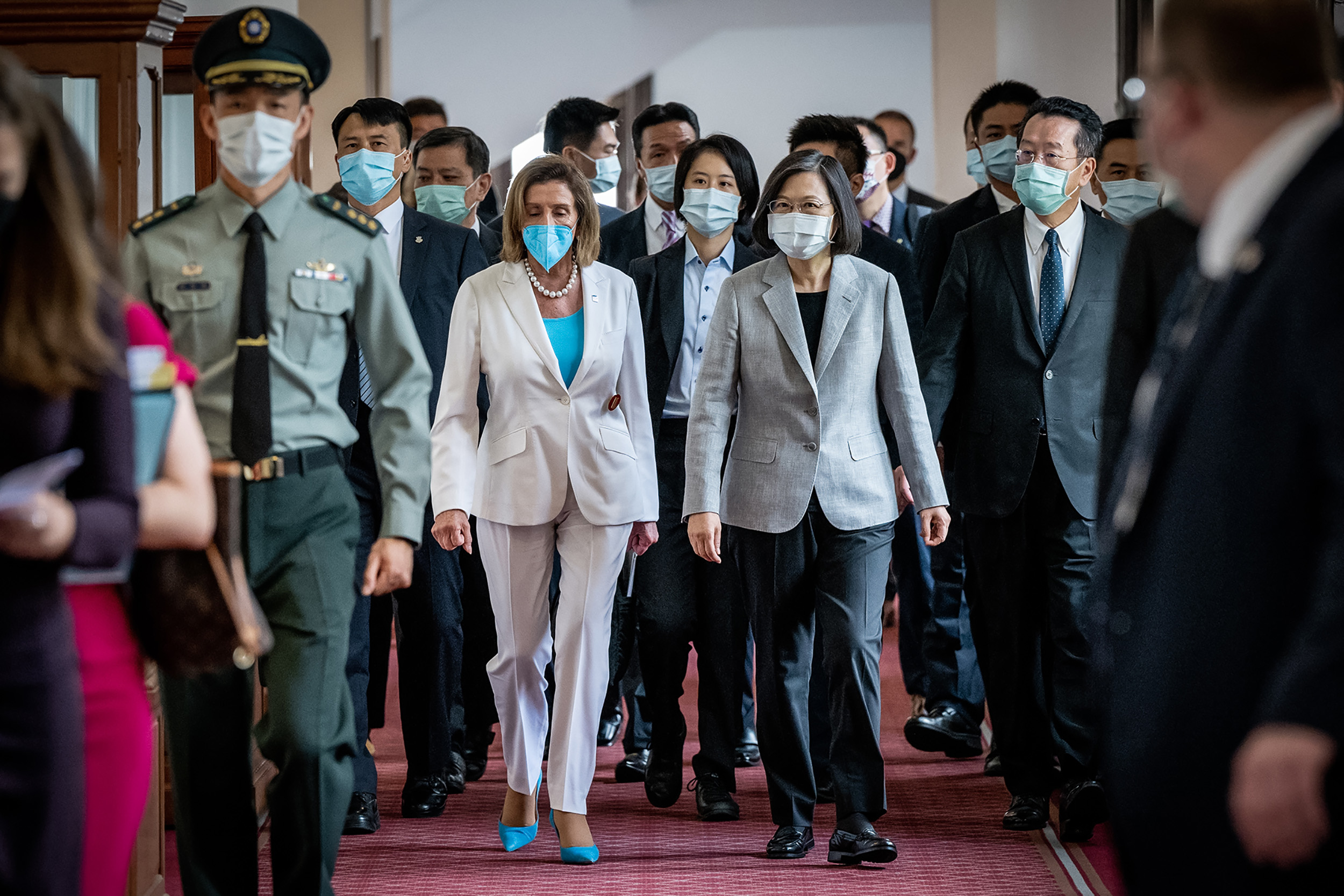 Nancy Pelosi, center left, speaks with Taiwan's President Tsai Ing-wen, center right, after arriving at the president's office on August 3, in Taipei, Taiwan.