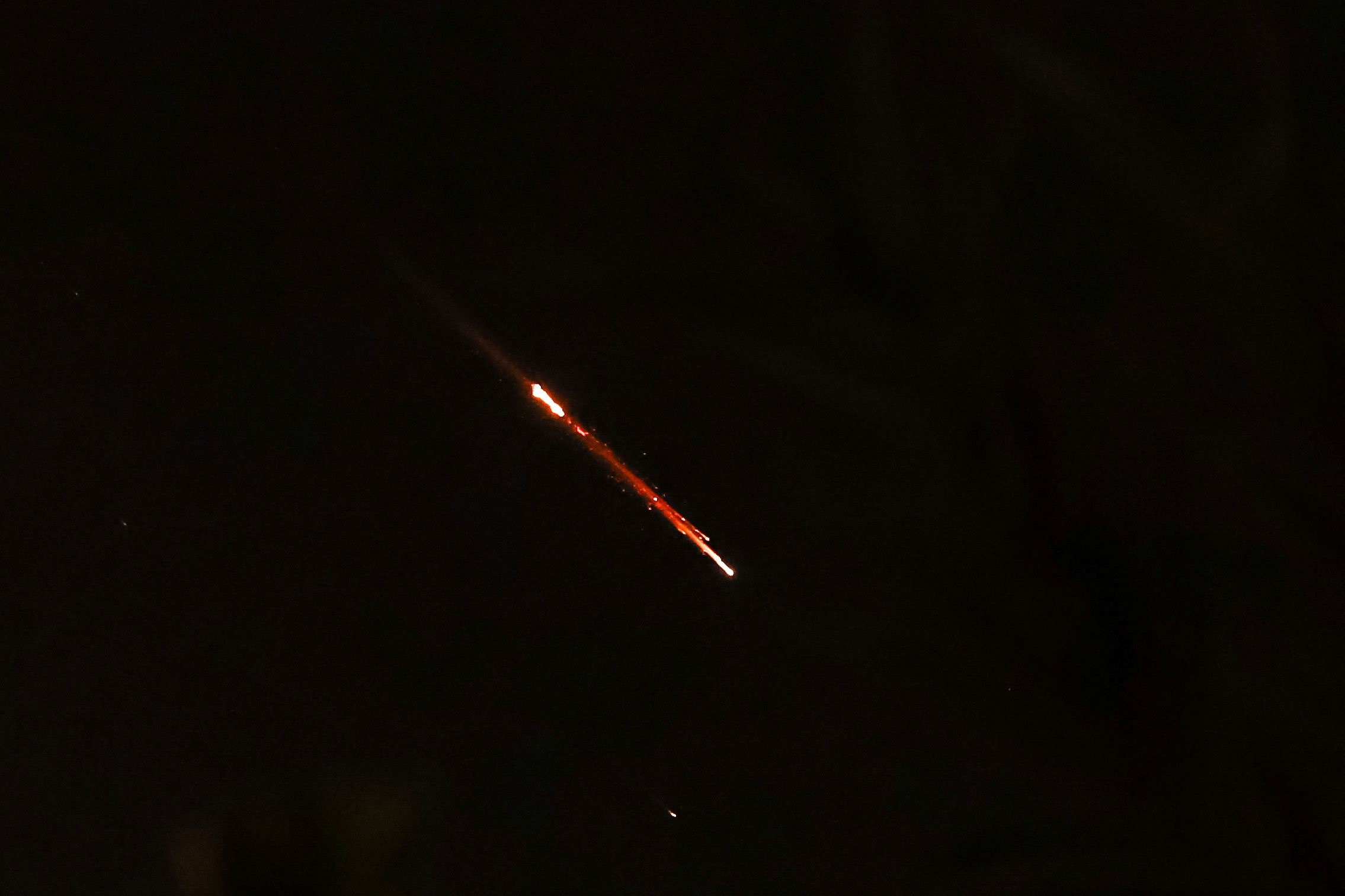Objects are seen in the sky above Jerusalem early Sunday, local time. 
